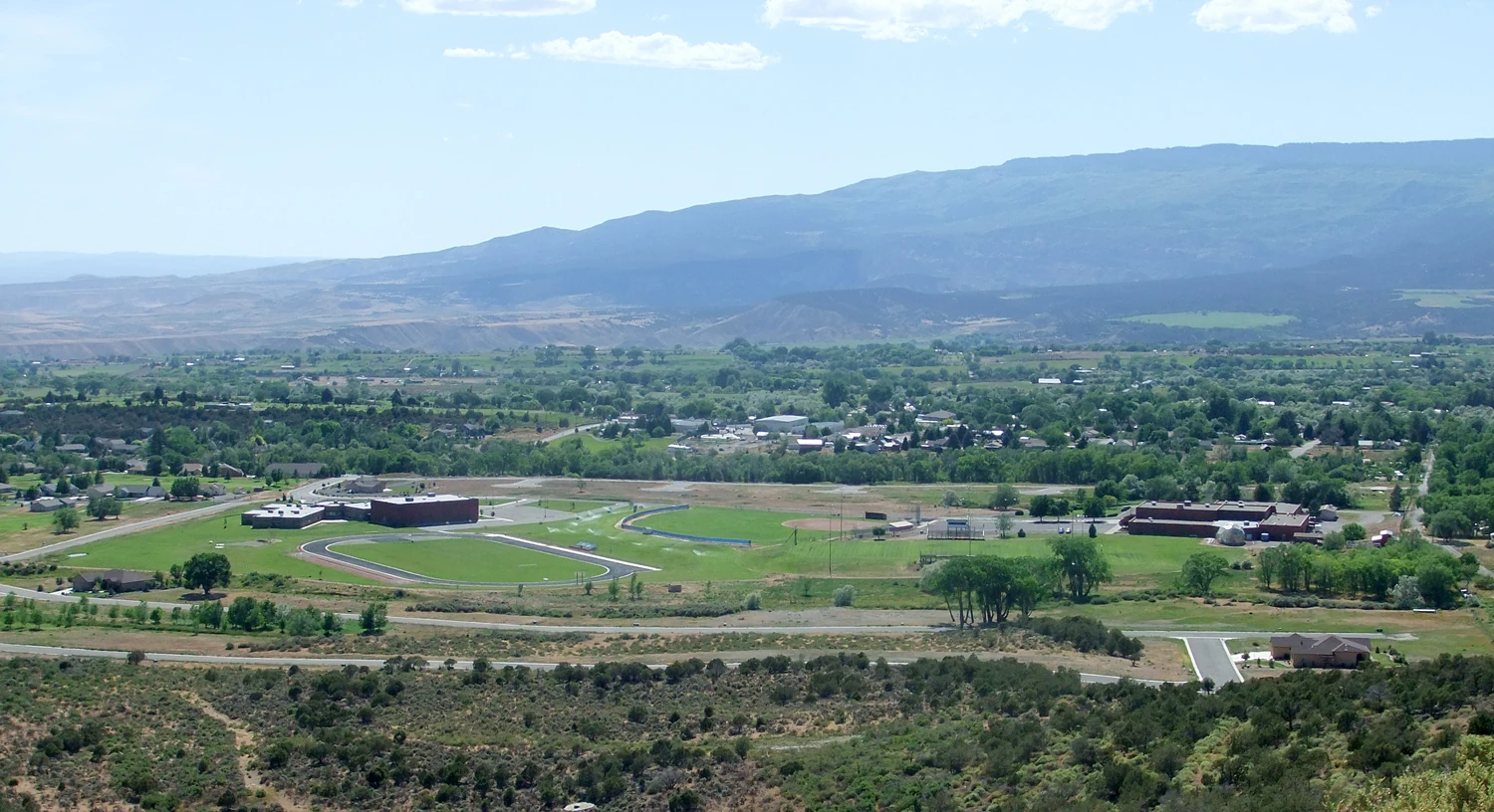 Cedaredge, Colorado, seen from Cedar Mesa with the surrounding valley and mountains
