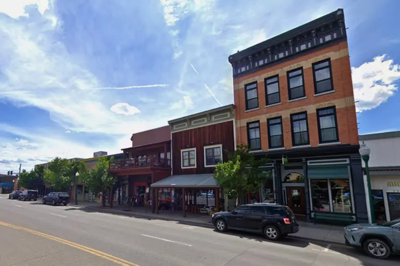 Historic storefronts along a street in downtown Gunnison, Colorado