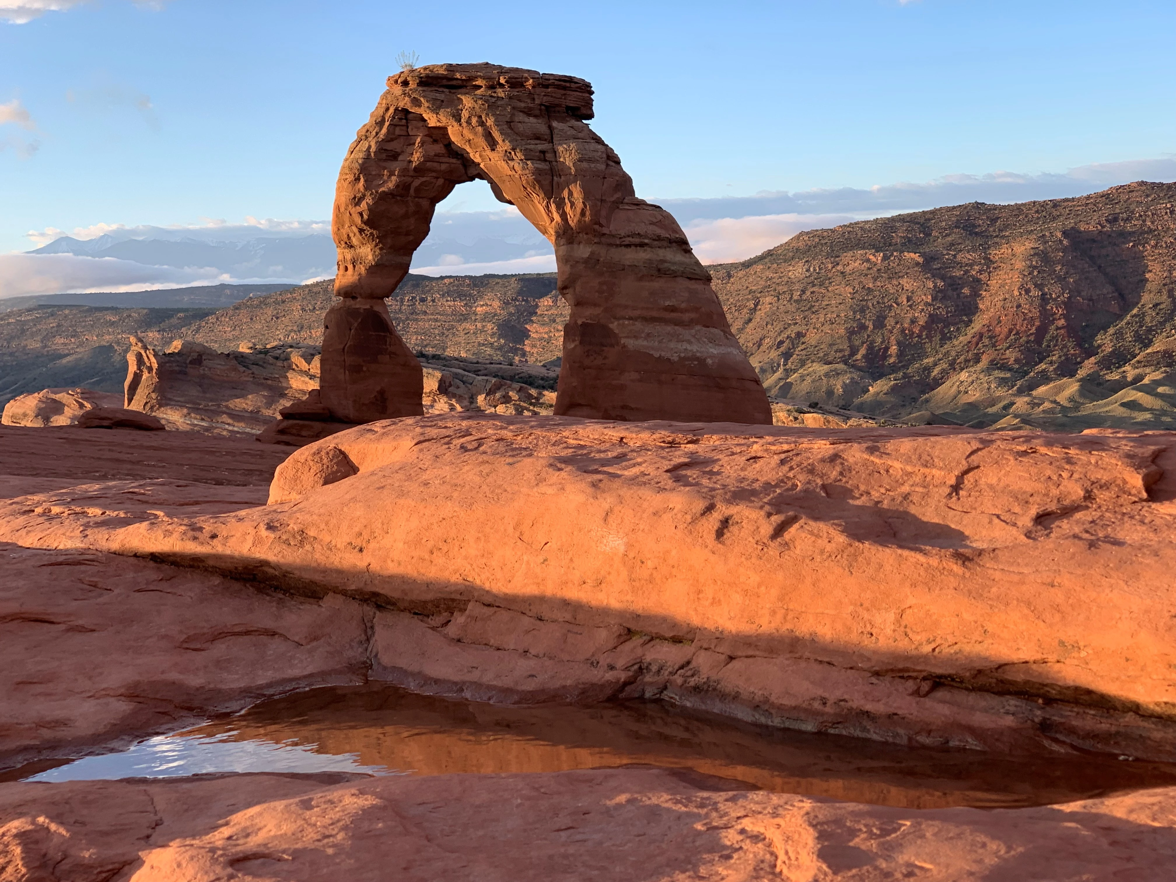 Delicate Arch and red sandstone scenery in Arches National Park near Moab, Utah