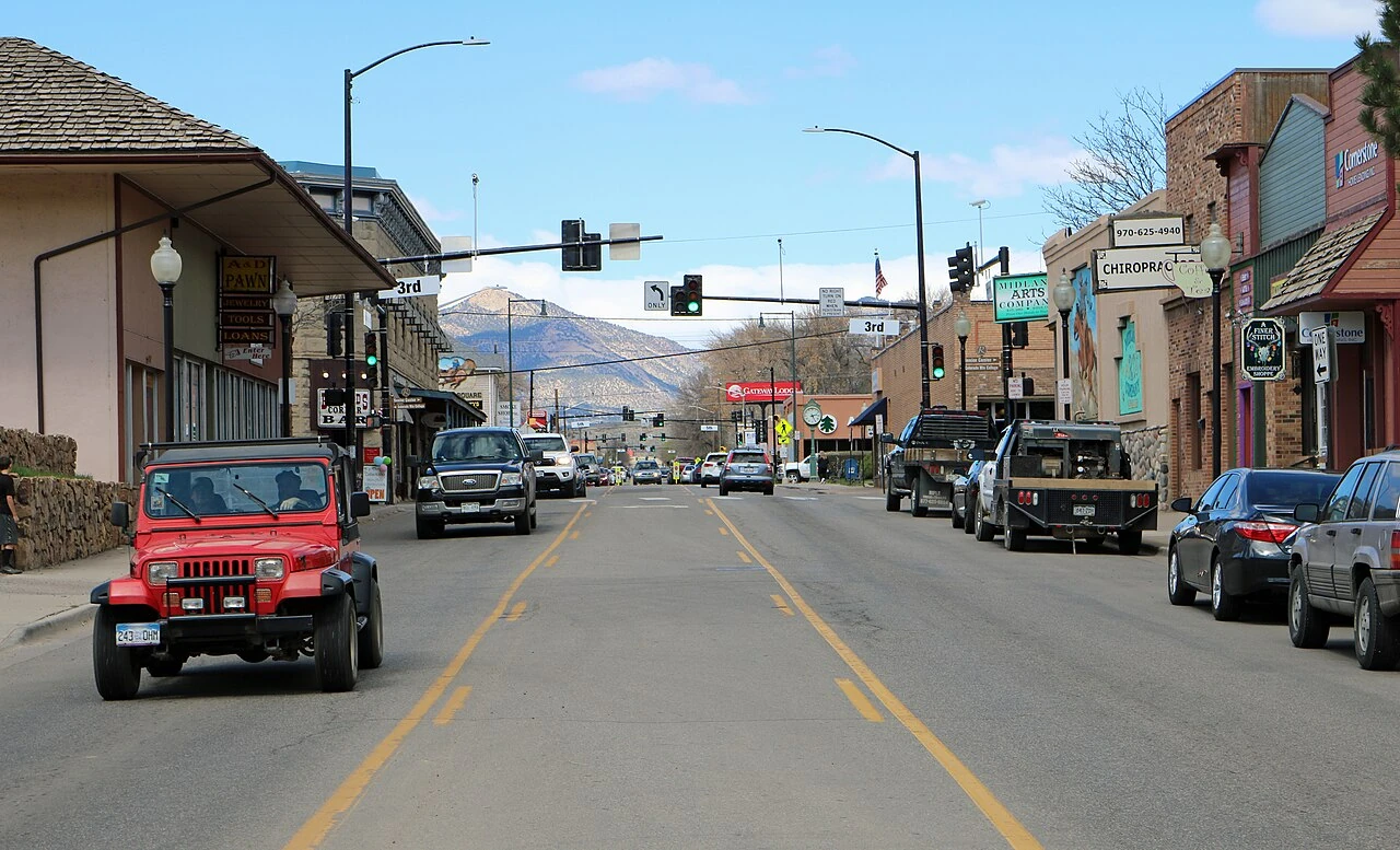 Railroad Avenue in Rifle, Colorado, with the Grand Hogback in the distance